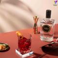 Imagen cóctel Negroni con botella de Oro Gin